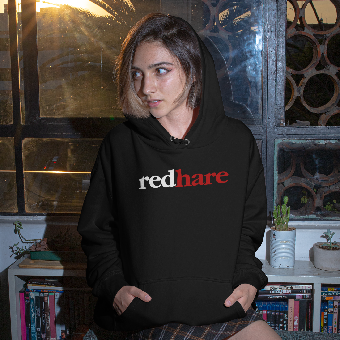 hoodie-mockup-of-a-woman-sitting-by-a-window-at-sunrise-m538